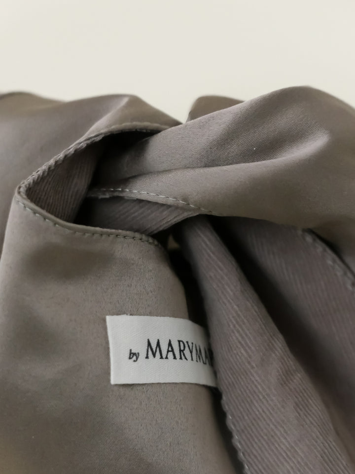 The Beige Monogram Pouch