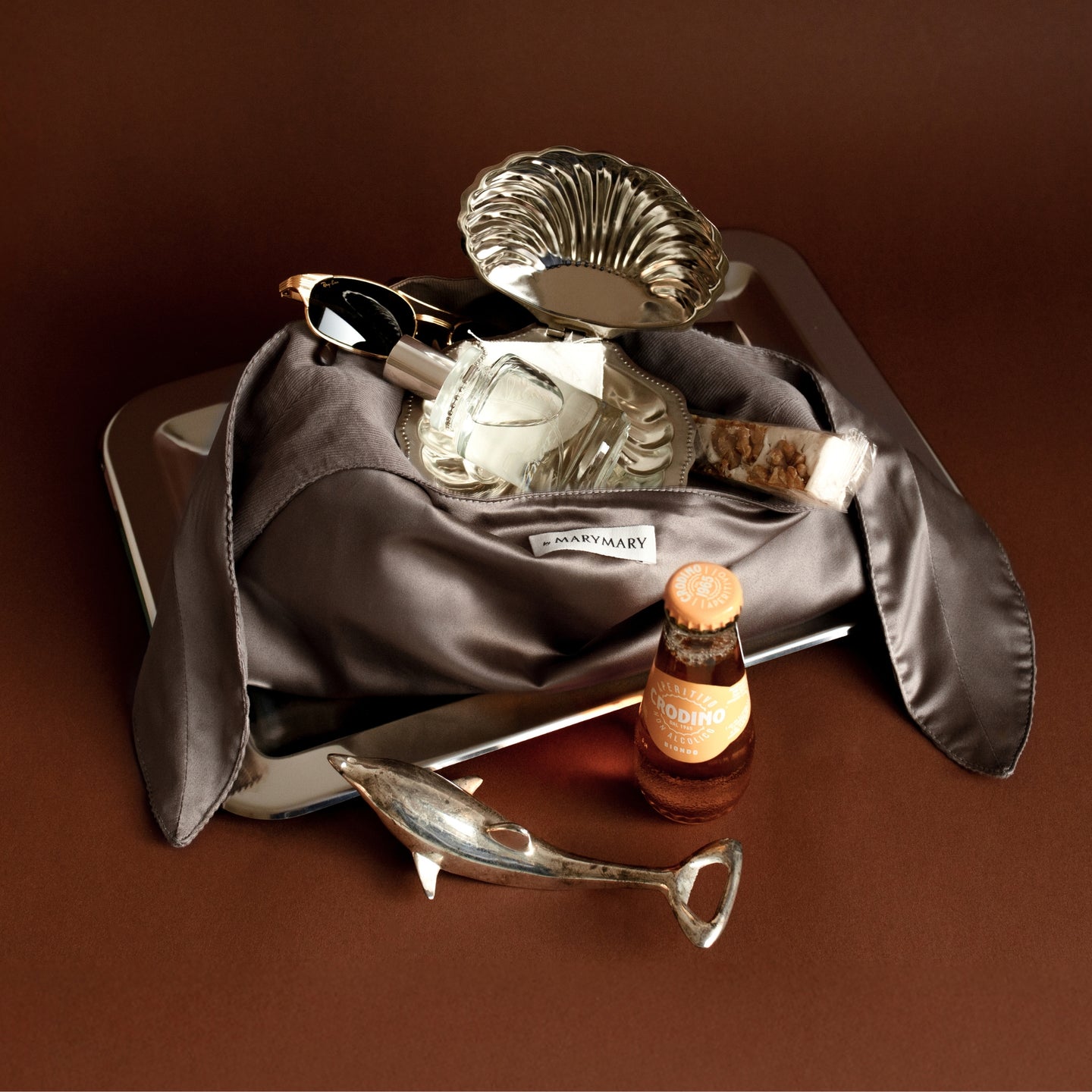 The Beige Monogram Pouch